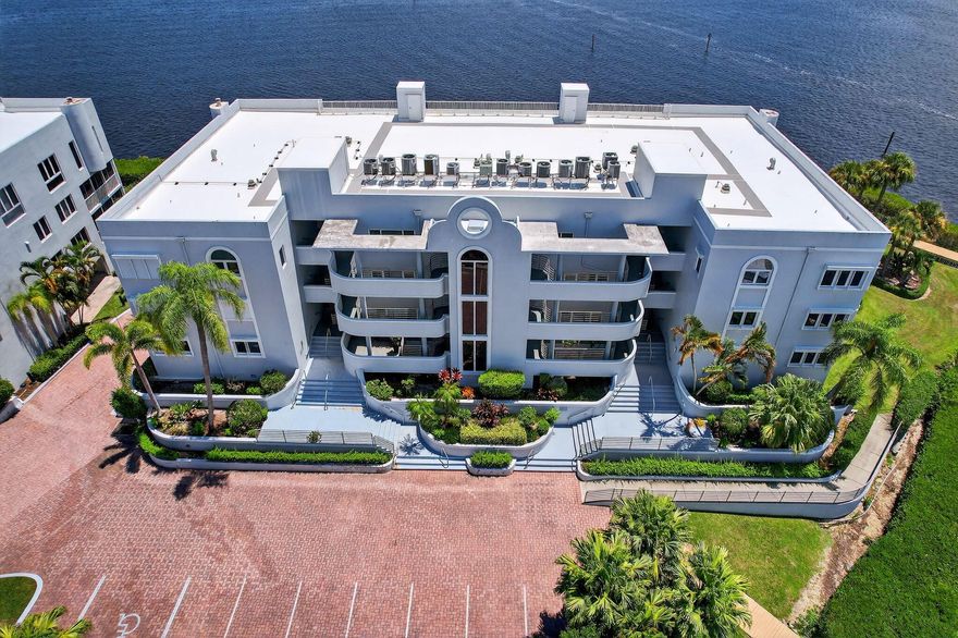 IMAGINE A WIDE WATERFRONT COASTAL CONDO to WAKE UP in EACH DAY! PANORAMIC RIVER VIEWS in this WRAP AROUND CORNER CONDO THAT OVERLOOKS the SAINT LUCIE! YOU'LL LOVE the FAVORABLE WINDS and EAST EXPOSURE making this WONDERFUL 3 BEDROOM 2.5 BATH OPEN CONCEPT RIVERFRONT FEEL MORE LIKE A HOME than a CONDO! WRAPAROUND CORNER HAS VIEWS FROM ALL LIVING AREAS and MASTER SUITE TOO. COMPLETELY REMODELED WITH OPEN CONCEPT KITCHEN, BEAUTIFULLY DONE... GUEST ROOMS, WALK IN PANTRY, UTILITY ROOM & EXTRA STORAGE. THIS ONE of a KIND MARINA COMMUNITY HAS CLUBHOUSE, HEATED POOL, FITNESS CENTER and HAS 40' DOCK AVAILABLE FOR LEASE TO BUYER for COASTAL CRUISING! CALL TODAY!!!