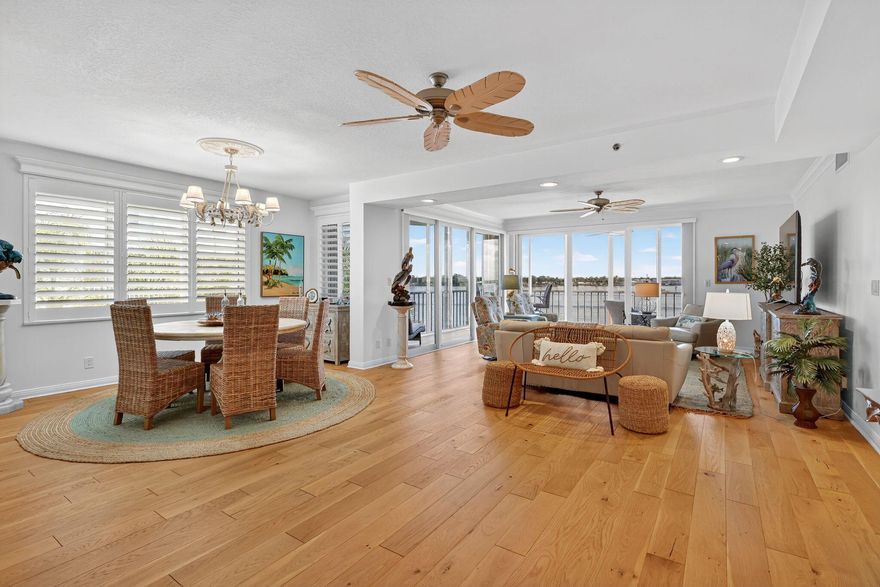 IMAGINE A WIDE WATERFRONT COASTAL CONDO to WAKE UP in EACH DAY! PANORAMIC RIVER VIEWS in this WRAP AROUND CORNER CONDO THAT OVERLOOKS the SAINT LUCIE! YOU'LL LOVE the FAVORABLE WINDS and EAST EXPOSURE making this WONDERFUL 3 BEDROOM 2.5 BATH OPEN CONCEPT RIVERFRONT FEEL MORE LIKE A HOME than a CONDO! WRAPAROUND CORNER HAS VIEWS FROM ALL LIVING AREAS and MASTER SUITE TOO. COMPLETELY REMODELED WITH OPEN CONCEPT KITCHEN, BEAUTIFULLY DONE... GUEST ROOMS, WALK IN PANTRY, UTILITY ROOM & EXTRA STORAGE. THIS ONE of a KIND MARINA COMMUNITY HAS CLUBHOUSE, HEATED POOL, FITNESS CENTER and HAS 40' DOCK AVAILABLE FOR LEASE TO BUYER for COASTAL CRUISING! CALL TODAY!!!