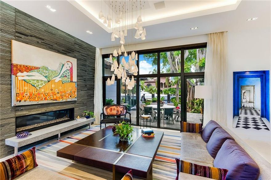 One of a kind Waterfront Masterpiece off Las Olas Blvd. This ONE story estate brings luxury to another level. Rebuilt in 2014 by Bill Bentz & Designed by Fred Furze.  Most incredible finishes.  Enjoy 17 foot ceilings, Home theater, Infinity pool with summer kitchen, & over 100 year old banyan tree in back yard. Not to mention great dockage. 120 foot dock to accommodate mega yacht. Over $8 million spent on this estate. Tax rolls will show Buyer paid commissions and stamp tax.