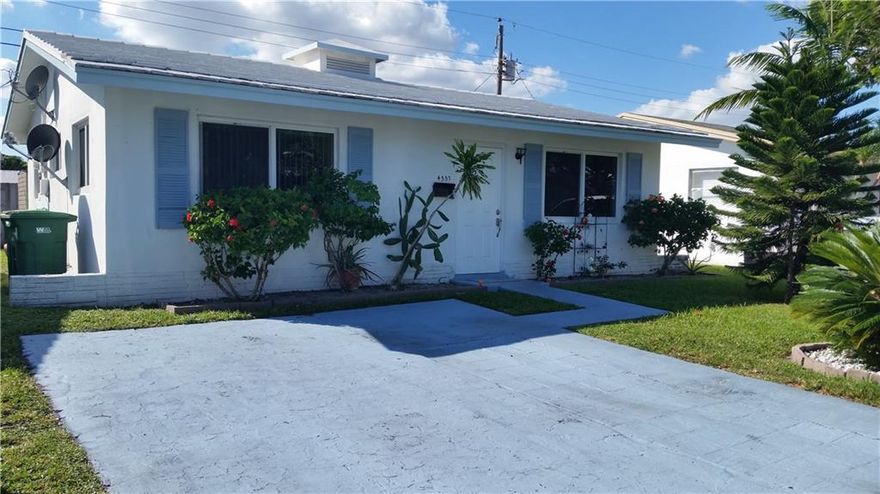 Very cute house in a wonderful, very quiet neighborhood where people know each other. Kitchen complete remodeled w/nice brown cabinets, granite like counters, stainless steel appliances, large snack counter and glass pendant lights. Bathroom upgraded for a lot more storage space. All floors tile. Spacious screened patio w/access to laundry/storage room. High impact windows and doors. Extended driveway for 2 cars. Community has a great covered BBQ area for your parties and a great pool by the lake.