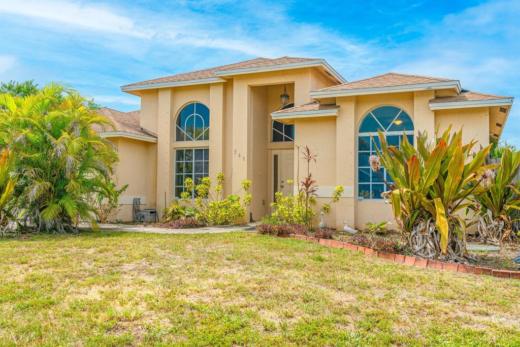 Photo of 565 SW Halkell Avenue, Port Saint Lucie, FL 34953 (MLS # R11003368)