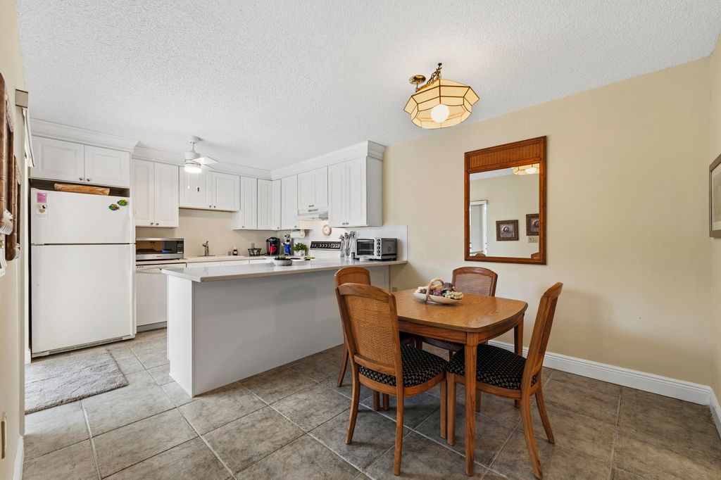 Photo of 5720 SE Windsong Lane #326, Stuart, FL 34997 (MLS # B26001281)