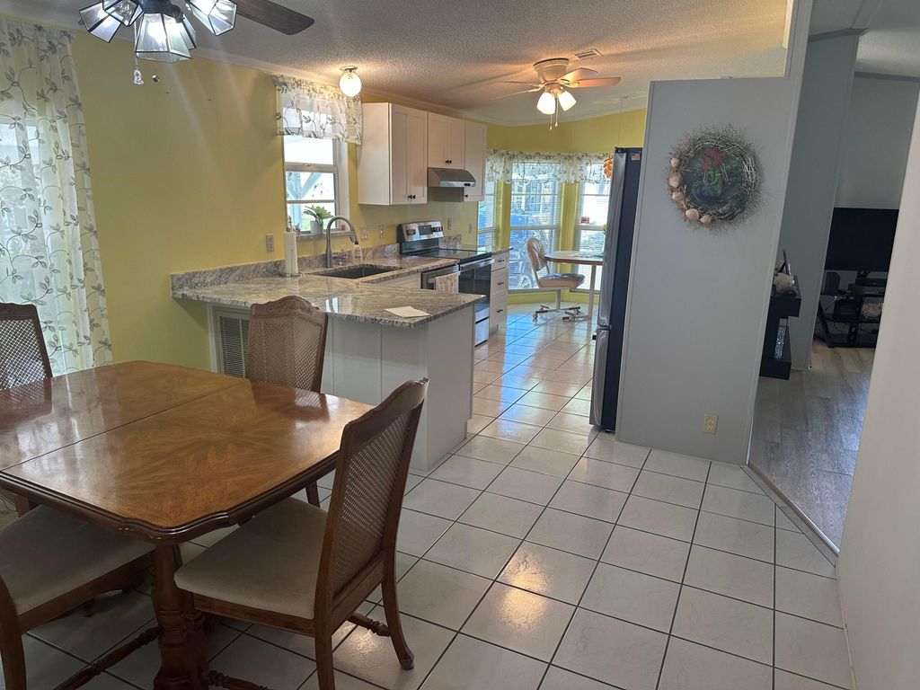 Photo of 515 Thames Bluff Ridge #34, Fort Pierce, FL 34982 (MLS # B26016474)