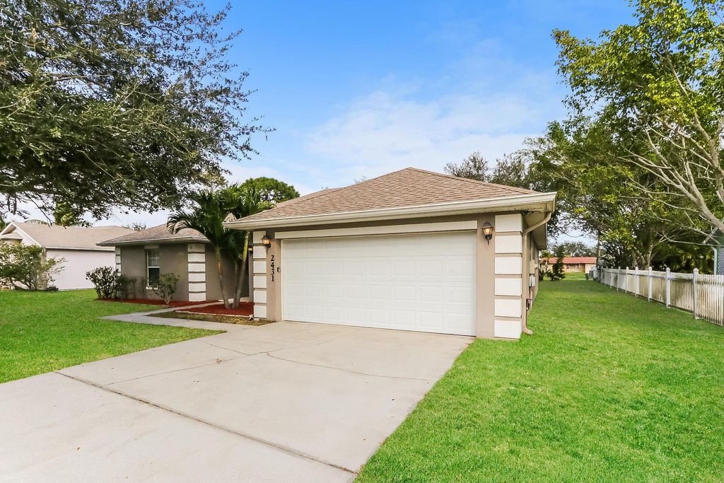 Photo of 2431 SE Gilbert Avenue, Port Saint Lucie, FL 34952 (MLS # R11043888)
