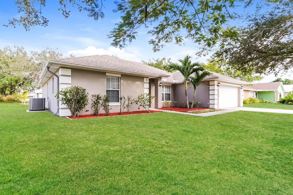 Photo of 2431 SE Gilbert Avenue, Port Saint Lucie, FL 34952 (MLS # R11043888)