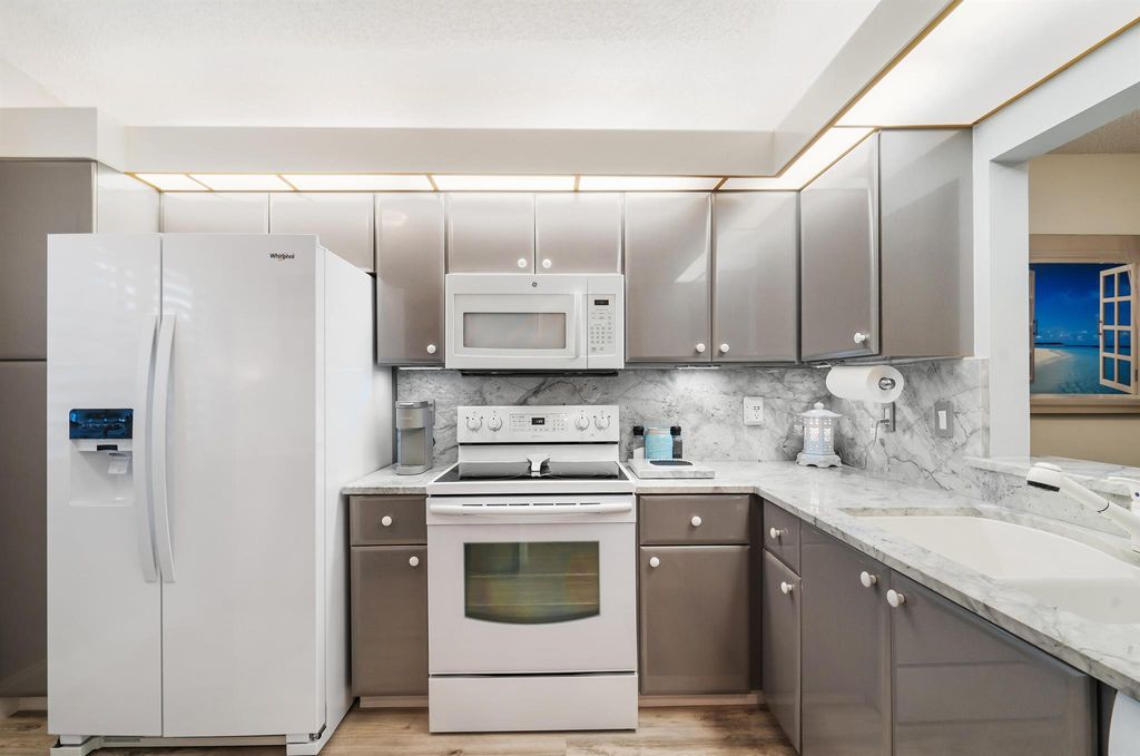 Photo of 6210 Pointe Regal Circle, Delray Beach, FL 33484 (MLS # R10951501)
