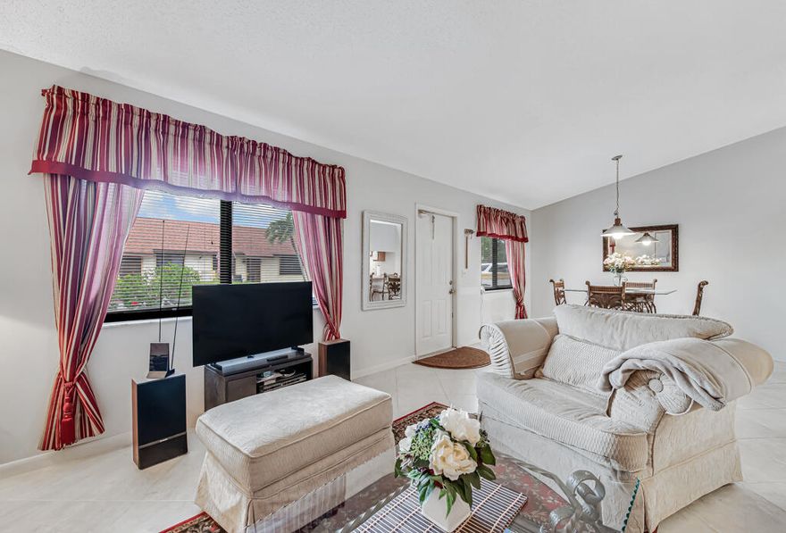 Welcome to one of Lantana's best-kept secrets — Redding Manor! This charming 21-unit all age community offers a peaceful setting with a pool, laundry, storage, and community room. This well kept fully furnished 2BR/1.5BA villa style condo is filled with natural light and features impact windows, and a new roof and AC. Enjoy a spacious front patio perfect for dining or grilling. Located in a quiet neighborhood just minutes from the beach, shopping, and I-95, and within walking distance to Publix, Aldi, restaurants, shopping, and more. A perfect place to call home or your own South Florida getaway!