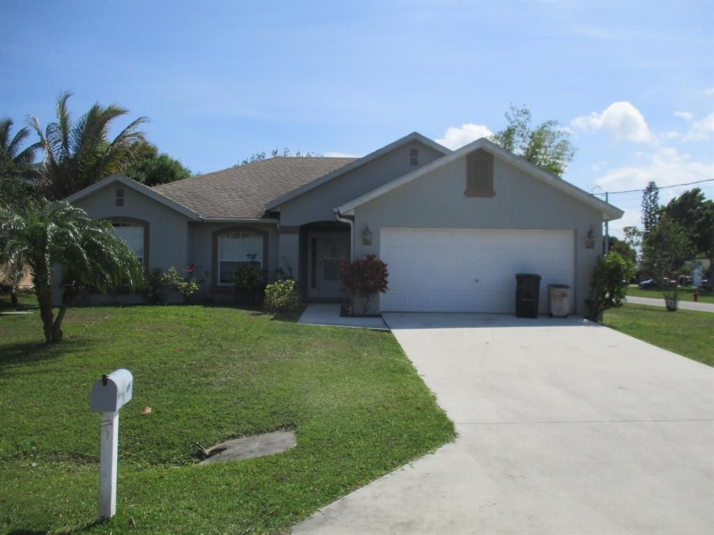 Photo of 606 Ash Street, Port Saint Lucie, FL 34952 (MLS # R10699764)