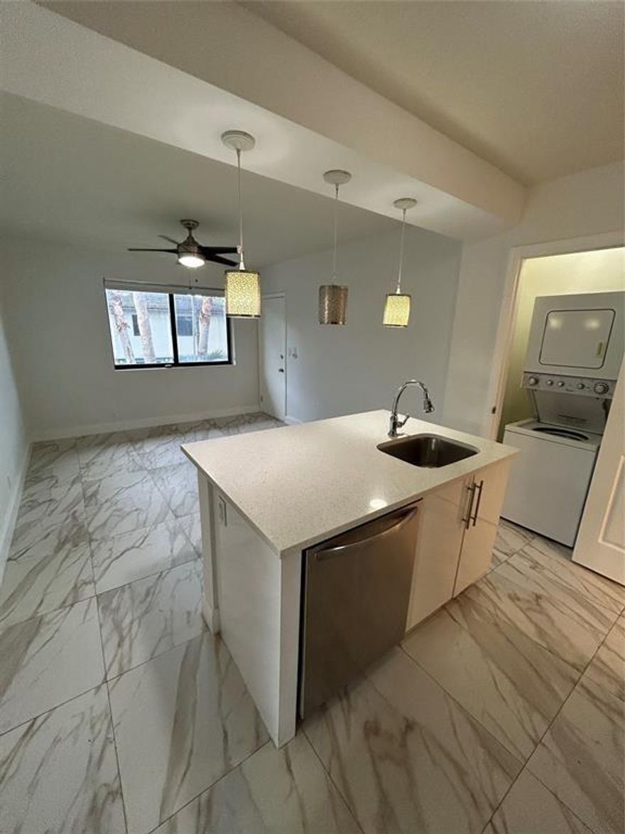 Now available for rent— a bright and updated 2-bedroom, 2-bath unit in Victoria Park. This second-floor home has a clean, modern feel with porcelain tile throughout, impact windows and doors, central A/C, and plenty of natural light. The kitchen features white cabinets with quartz countertops, and both bathrooms have been beautifully redone. You’ll also have the convenience of your own washer and dryer, one assigned parking spot, and the option to bring your pet. The location couldn’t be better. Close to shopping, restaurants, parks, and just a quick drive to the beach, Las Olas, and Downtown Fort Lauderdale.