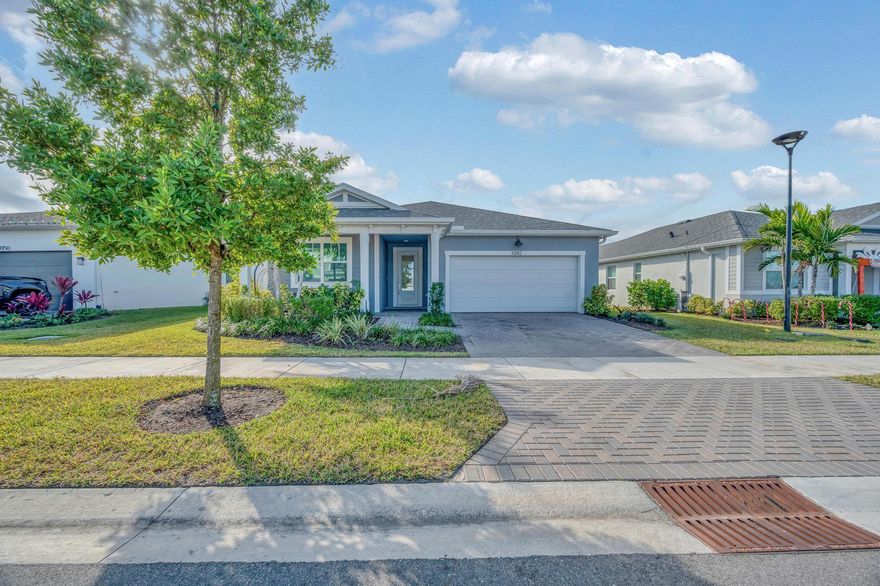 Welcome to this almost new well-maintained 3 bedroom 2 bath home located in one of Port St. Lucie's most sought-after communities. This inviting residence offers a bright, open layout designed for comfortable everyday living and effortless entertaining. The kitchen flows seamlessly into the main living areas, while 3 generous bedrooms provide plenty of space to relax and unwind. Enjoy modern finishes, ample storage, and a thoughtfully designed floor plan that maximizes natural light throughout the home. Situated on a quiet street, this property offers both privacy and convenience, with easy access to shopping, dining, parks, schools, and major roadways. Whether you're relocating, downsizing, or simply looking to enjoy the Tradition lifestyle, this home is a fantastic opportunity.