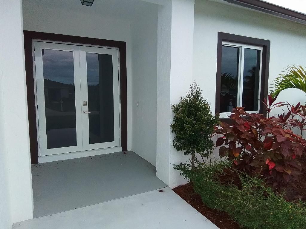 Photo of 1258 SW Santiago Avenue, Port Saint Lucie, FL 34953 (MLS # R10996493)