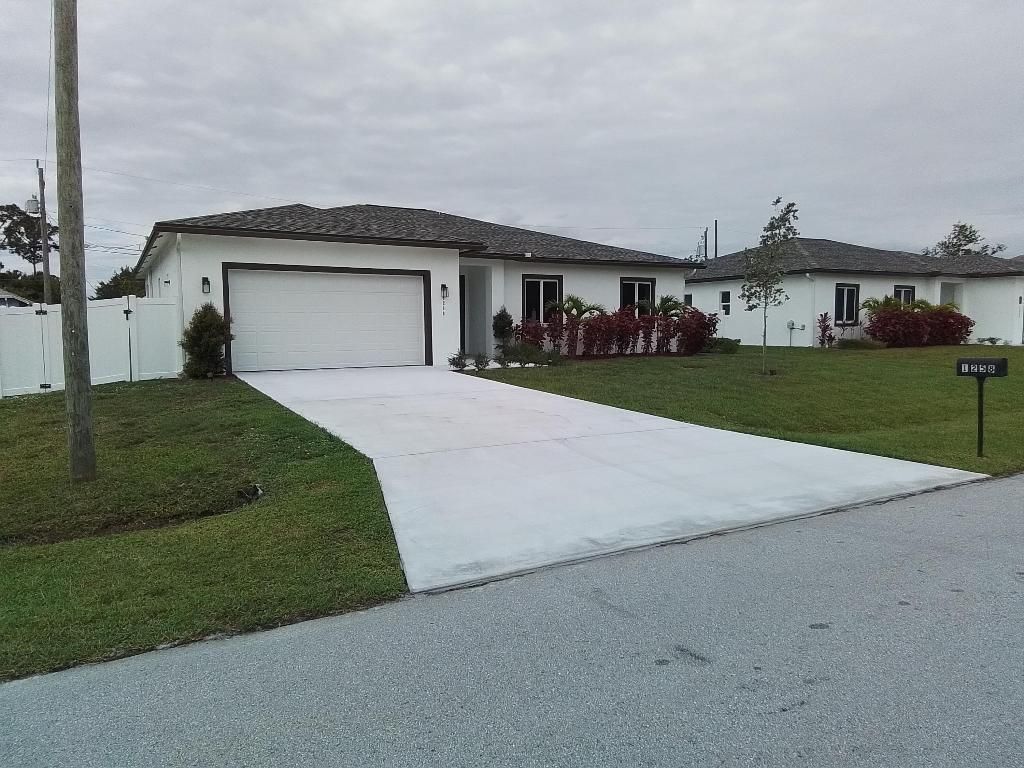 Photo of 1258 SW Santiago Avenue, Port Saint Lucie, FL 34953 (MLS # R10996493)