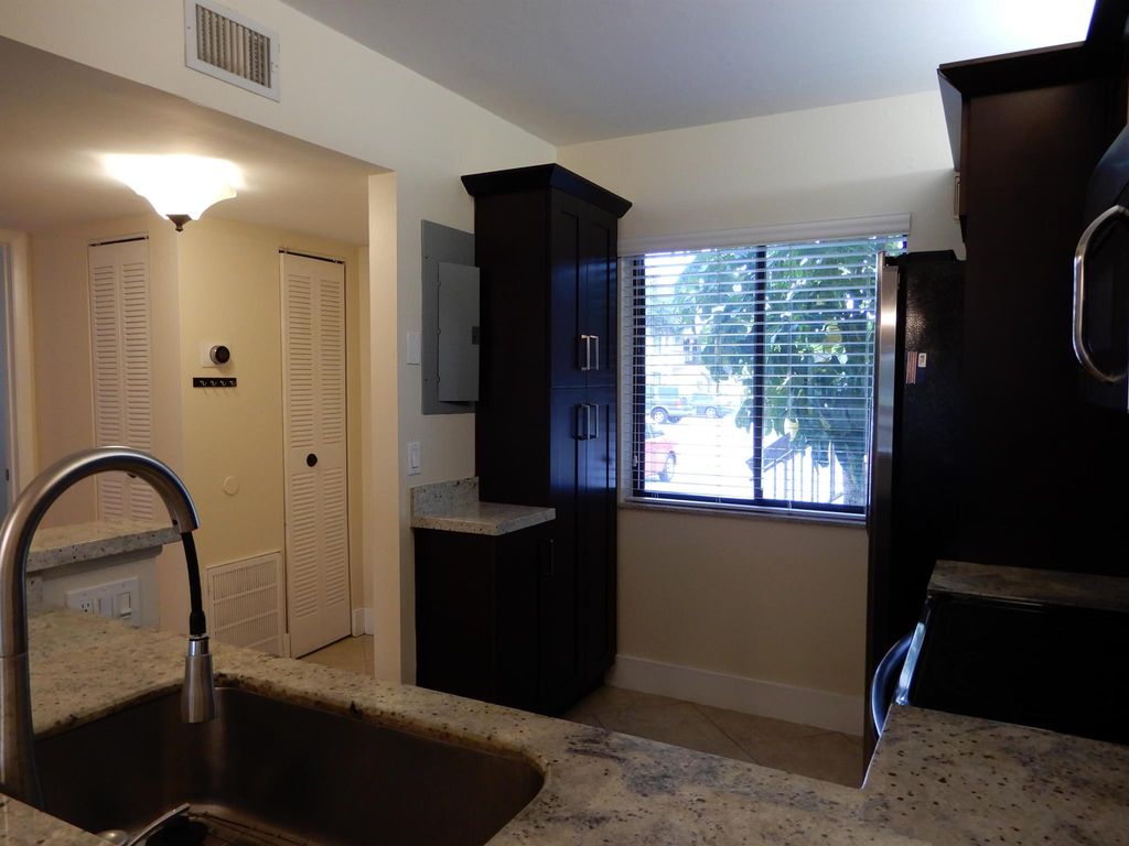 Photo of 6585 Somerset Drive #102, Boca Raton, FL 33433 (MLS # R11115496)