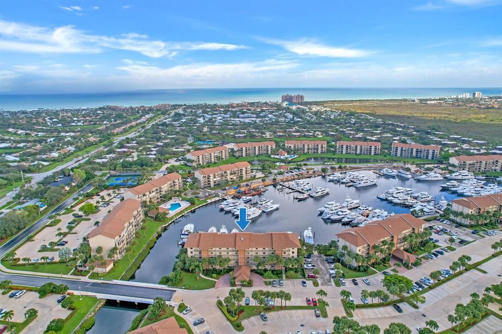 Photo of 2601 Marina Isle Way #103, Jupiter, FL 33477 (MLS # R10852659)