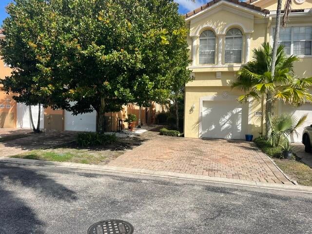 Photo of 3228 Mirella Drive, Riviera Beach, FL 33404 (MLS # B26091347)