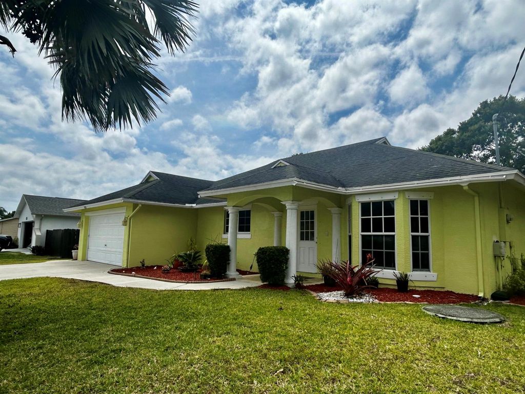 Photo of 1658 SW Import Drive, Port Saint Lucie, FL 34953 (MLS # R11084268)