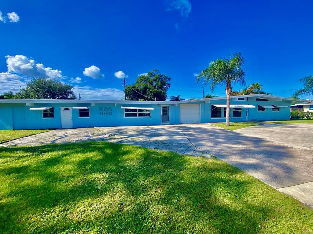 Photo of 310 Olive Avenue, Port Saint Lucie, FL 34952 (MLS # R10758077)