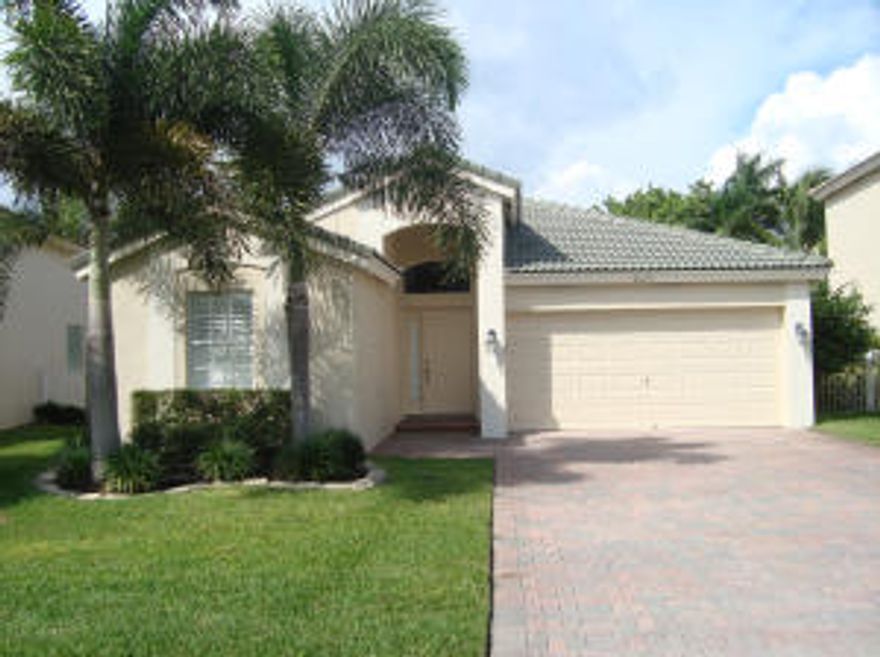 This immaculate 3/2/2 home is move-in ready. It has been meticulously maintained and remodeled with high end finishes throughout. Brand new laminate wood flooring, plantation shutters, custom moldings, and paint are just a few of the upgrades. The kitchen, which features stainless steel appliances, granite counter tops, and an island opens up to the family room, a plus for entertaining. The dinette area has a beautiful custom-built bench with storage. Spacious master suite features a huge custom-built closet, frame-less shower and spa tub, and opens to a custom-built salt water pool with beautiful marble decking. Close to restaurants and shopping. Minutes away from equestrian events.