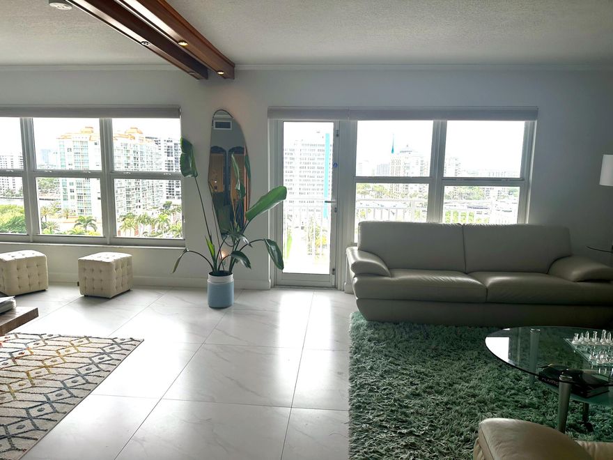 Incredible 14th floor 2/2 with amazing views all around water!!! Rarely available must see!!! updated unit all ceramic tile throughout, with stainless appliances.  Impact windows, move right in!!!!