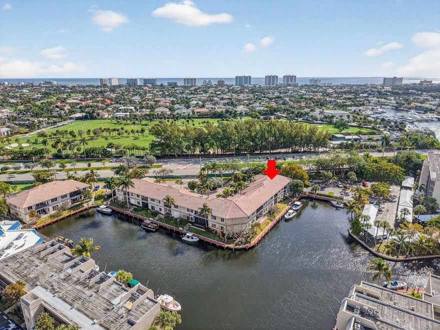 Impressive residence in East Boca on the water. Located in the gated 'Harbour Homes' here you have it all: location, amenities, size, modern finishes, and deeded boat dock! Step inside to soaring ceilings and a spacious layout. 4 bedrooms, 3.5 bathrooms almost 2300 sqft inside. Open concept kitchen includes quartz countertops, stainless steel appliances, pantry, and sleek grey solid wood cabinetry. Formal dining, primary suite & balcony overlooking the waterways. Lofty primary suite with 2 walk in closets and marble clad bathroom. Brand new Clubhouse! 5 waterfront pools, 2 tennis courts, bocce ball courts, gym, jogging paths, mini golf. Zoned for A rated schools. Surrounded by the Best of Boca including Mizner Park, top shops & dining, the beach, multiple parks, and the Boca Resort.