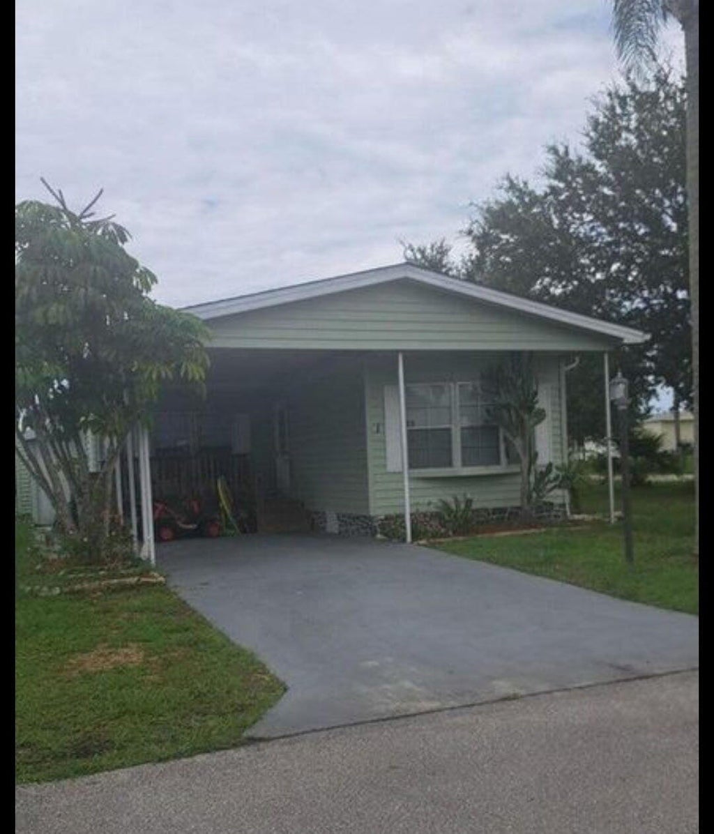 Photo of 1 Flores Way, Port Saint Lucie, FL 34952 (MLS # R11093075)