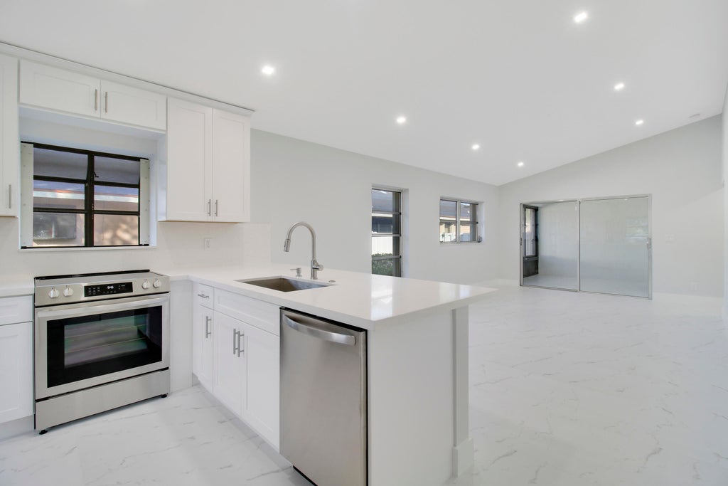 Photo of 8055 SWEETBRIAR Way, Boca Raton, FL 33496 (MLS # B26055266)