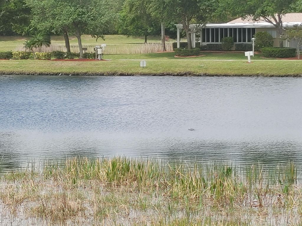 Photo of 3021 Five Iron Drive, Port Saint Lucie, FL 34952 (MLS # R10789198)