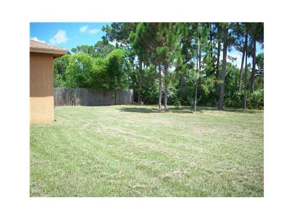 Photo of 6173 NW East Deville Circle, Port Saint Lucie, FL 34986 (MLS # R10931620)