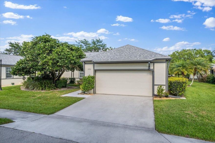 Beautifully maintained lakefront home, offering major updates for peace of mind & modern Florida living. This home features a 2022 roof, 2019 A/C, & a 2022 water heater, along w/ a full repipe completed four years ago. Inside, you'll find durable flooring throughout, while the garage showcases upgraded epoxy floors for a clean, finished look. Outdoor living w/ both a screened-in front porch & a spacious screened back lanai overlooking serene water views. W/ its strong updates, excellent condition, & access to great community amenities, this home offers comfort, efficiency, and long-term value.