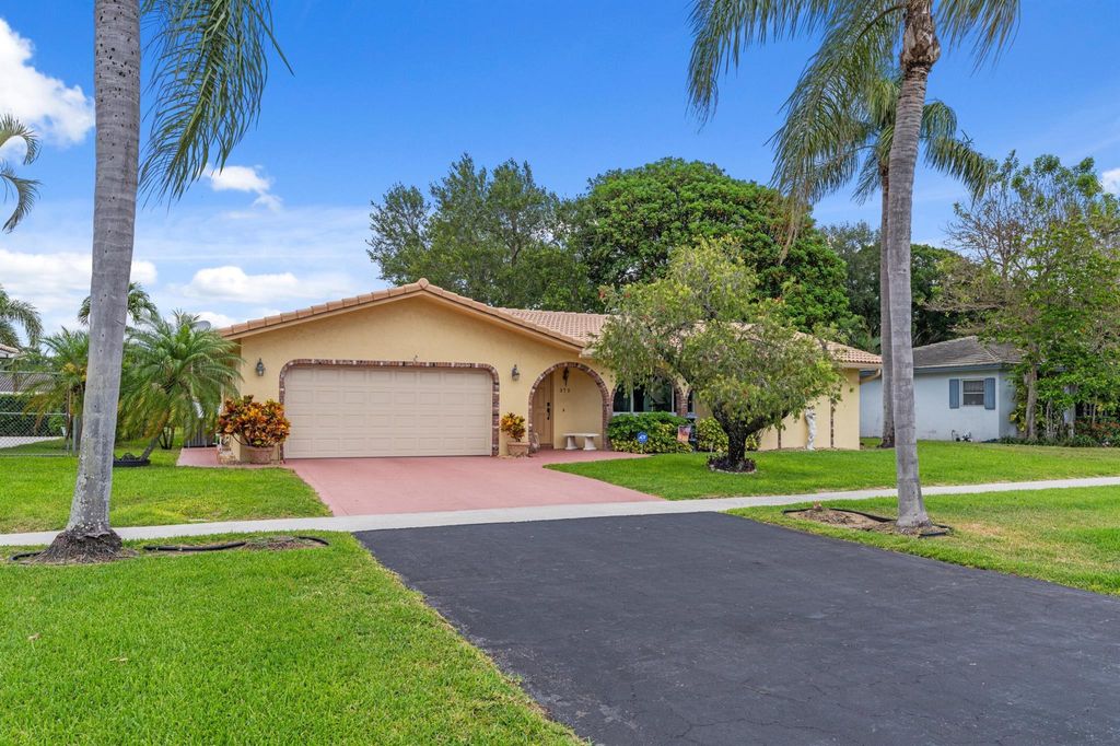 Photo of 979 NW 8th Street, Boca Raton, FL 33486 (MLS # R11083863)