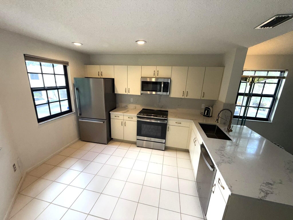 Photo of 6690 Montego Bay Boulevard #F, Boca Raton, FL 33433 (MLS # B26079891)
