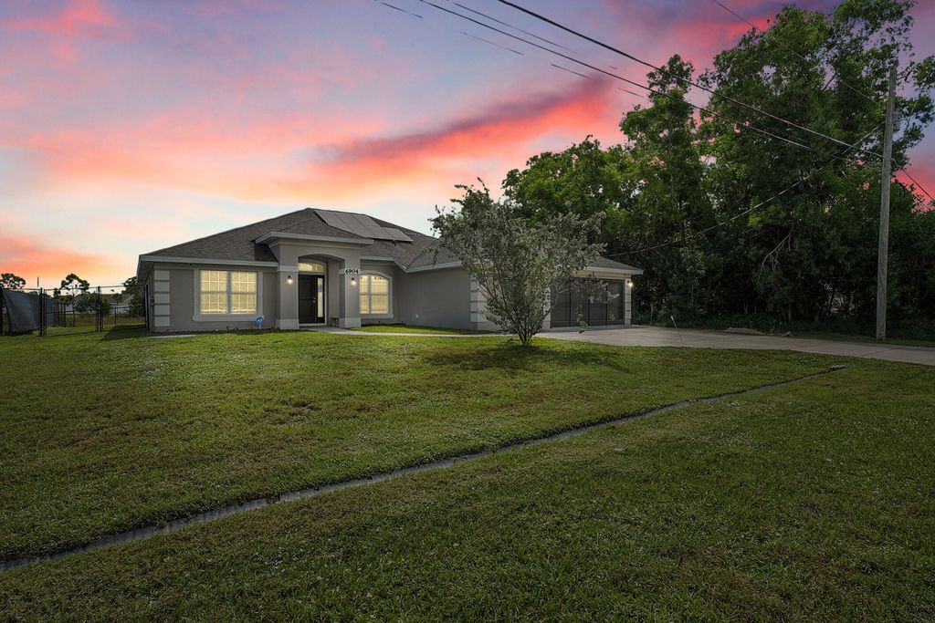 Photo of 6904 NW Dorothy Street, Port Saint Lucie, FL 34983 (MLS # R11114143)