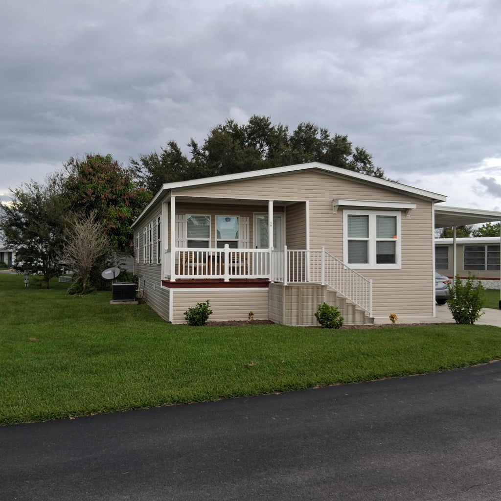 Photo of 56 Manor Drive, Fort Pierce, FL 34982 (MLS # B26079224)
