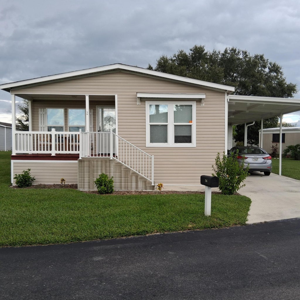 Photo of 56 Manor Drive, Fort Pierce, FL 34982 (MLS # B26079224)