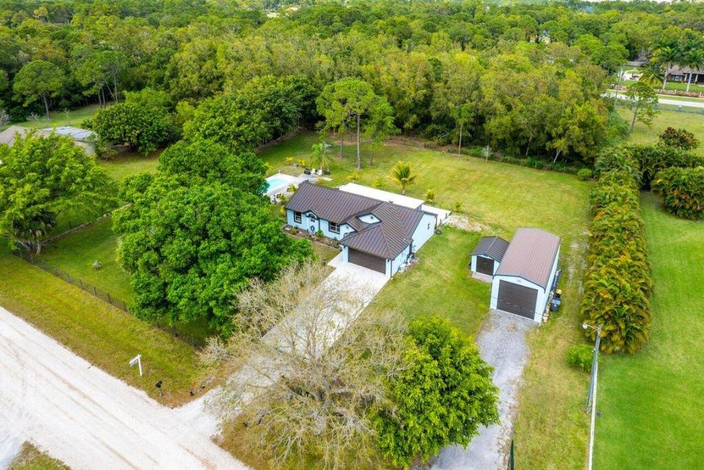 Photo of 12783 83rd Lane N, West Palm Beach, FL 33412 (MLS # R10965880)