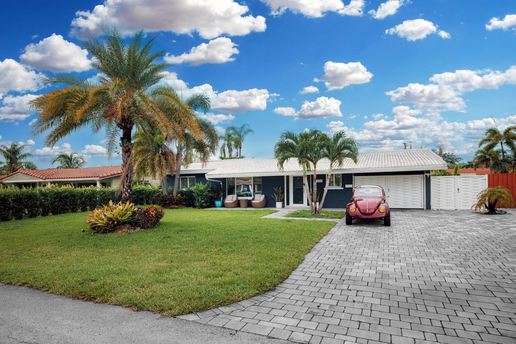 Photo of 1310 NE 46TH Street, Oakland Park, FL 33334 (MLS # B26060027)