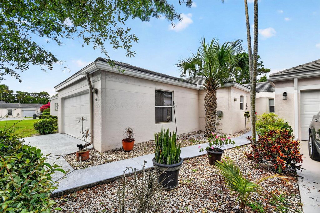 Photo of 1081 Island Manor Drive, Greenacres, FL 33413 (MLS # B26032384)