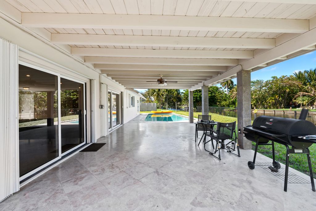 Photo of 1120 Renmar Drive, Plantation, FL 33317 (MLS # B26000278)