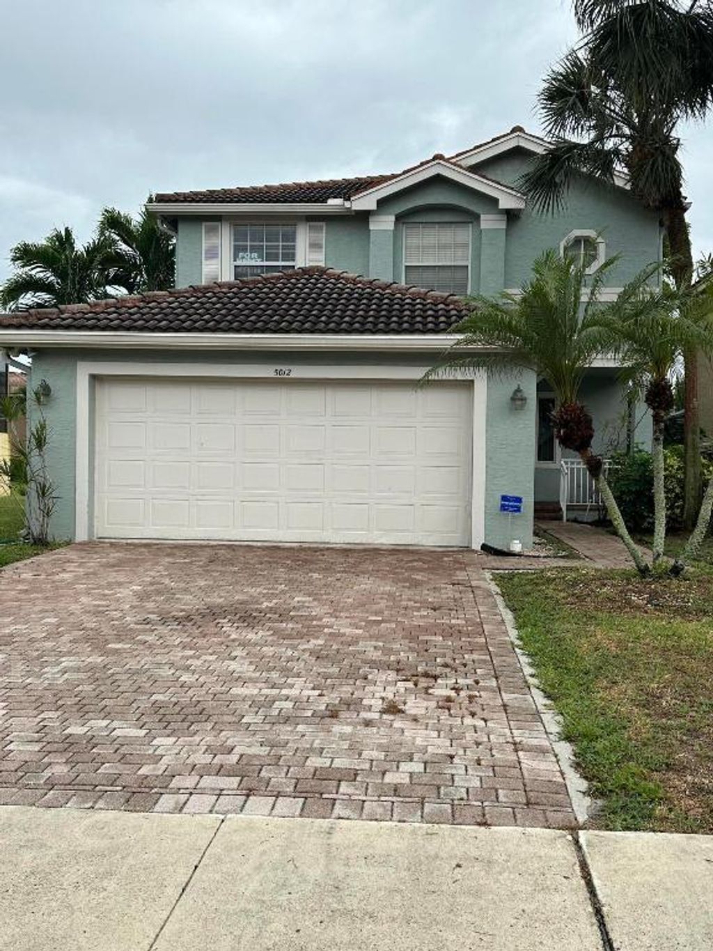 Photo of 5012 Starblaze Drive, Greenacres, FL 33463 (MLS # R11114401)