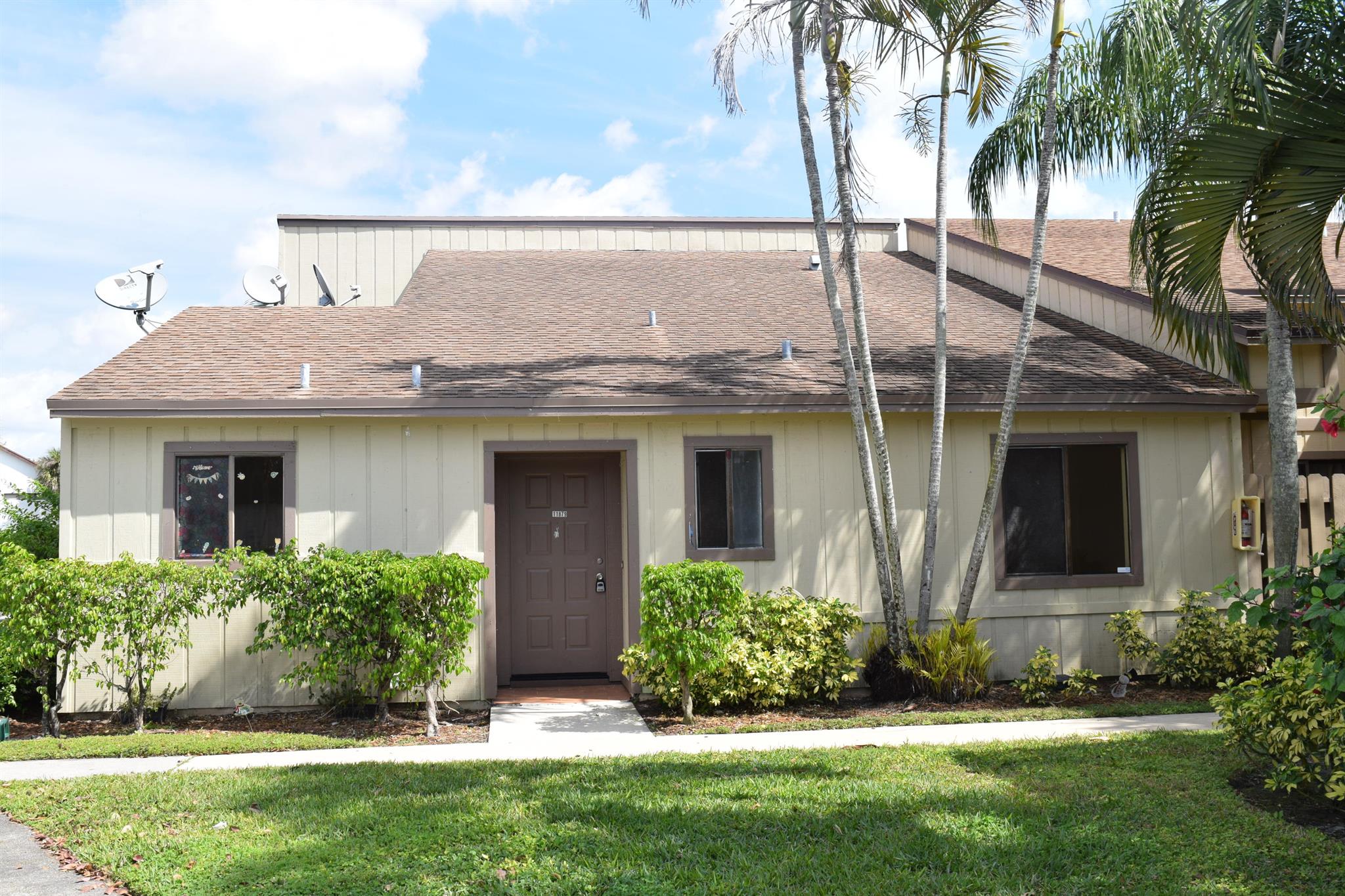 THIS AMAZING HUGE TOWNHOUSE WITH 2 MASTER SUITES! ALL TILE IN LIVING AREAS, EXTRA STORAGE INSIDE AND OFF PRIVATE FENCED PATIO. CORNER UNIT, ALL APPLIANCES INCLUDING FULL SIZE WASHER AND DRYER. NEWER AC UNIT.IT HAS TWO ASSIGNED PARKING SPACES. STORAGE ROOM AND CLOSE PARKING. COMMUNITY POOL AND WALKING DISTANCE TO WELLINGTON POOL/PLAYGROUND PARK, SHOPPING AND RESTAURANTS, TO WELLINGTON FESTIVITIES, A-RATED SCHOOLS, QUIET COMMUNITY ALL WAITING FOR YOU