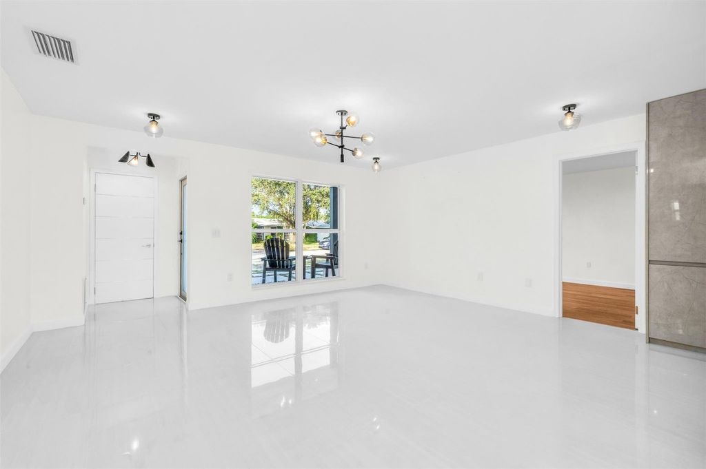 Photo of 11450 NW 32nd Place, Sunrise, FL 33323 (MLS # F10539538)