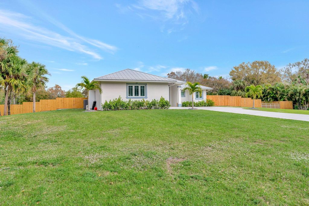 Photo of 10231 176th Lane N, Jupiter, FL 33478 (MLS # R11053944)
