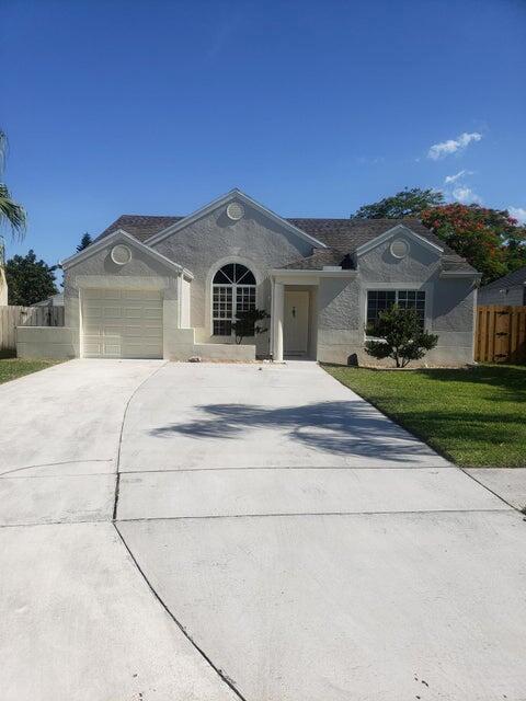 COMPLETELY RENOVATED HOME WITH AN OPEN FLOOR PLAN, LIGHT & BRIGHT, KITCHEN HAS QUARTZ COUNTERS, SS APPLIANCES, HURRICANE IMPACT WINDOWS & SLIDERS THROUGH OUT, WOOD FLOORS THROUGH OUT, FENCED IN YARD PERFECT FOR KIDS OR PETS, HUGE SCREENED & COVERED PATIO PERFECT FOR ENTERTAINING. INTERIOR OF HOUSE FRESHLY PAINTED & NEW SOD IN THE FENCED BACKYARD. BRAND NEW AC