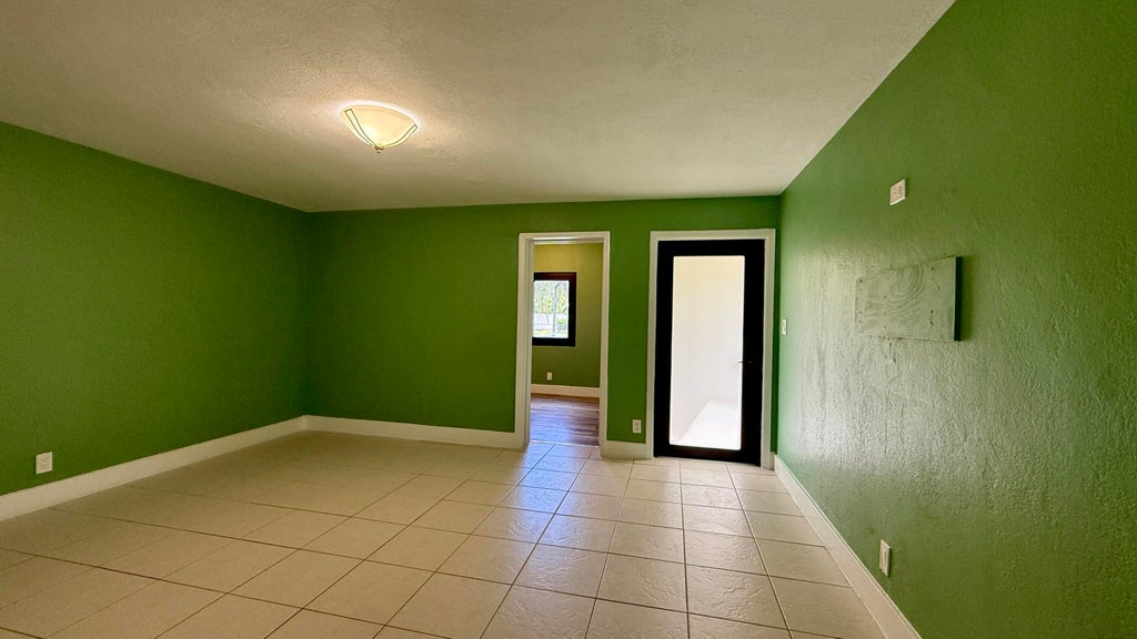 Photo of 4729 Myrtle Lane, West Palm Beach, FL 33417 (MLS # B26066064)