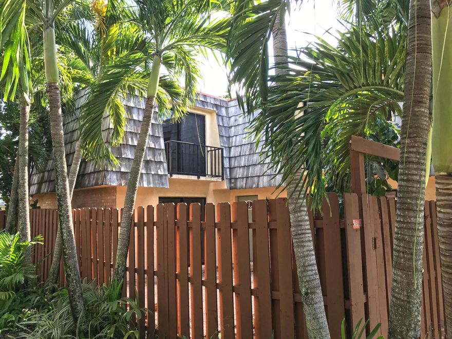 Recently renovated townhouse, with laminate wood flooring and tile bathrooms.  Unit enjoys a quiet and tranquil private front yard, storage area and 2 assigned parking spaces.
Large master bedroom and closet.  Laundry room with W/D.  Community pool, tennis courts and party room.  Minutes from parks, restaurants, and downtown West Palm Beach.  Minutes from I-95, Bright line and Palm Beach International Airport.
2 year America Home Shield Warranty.