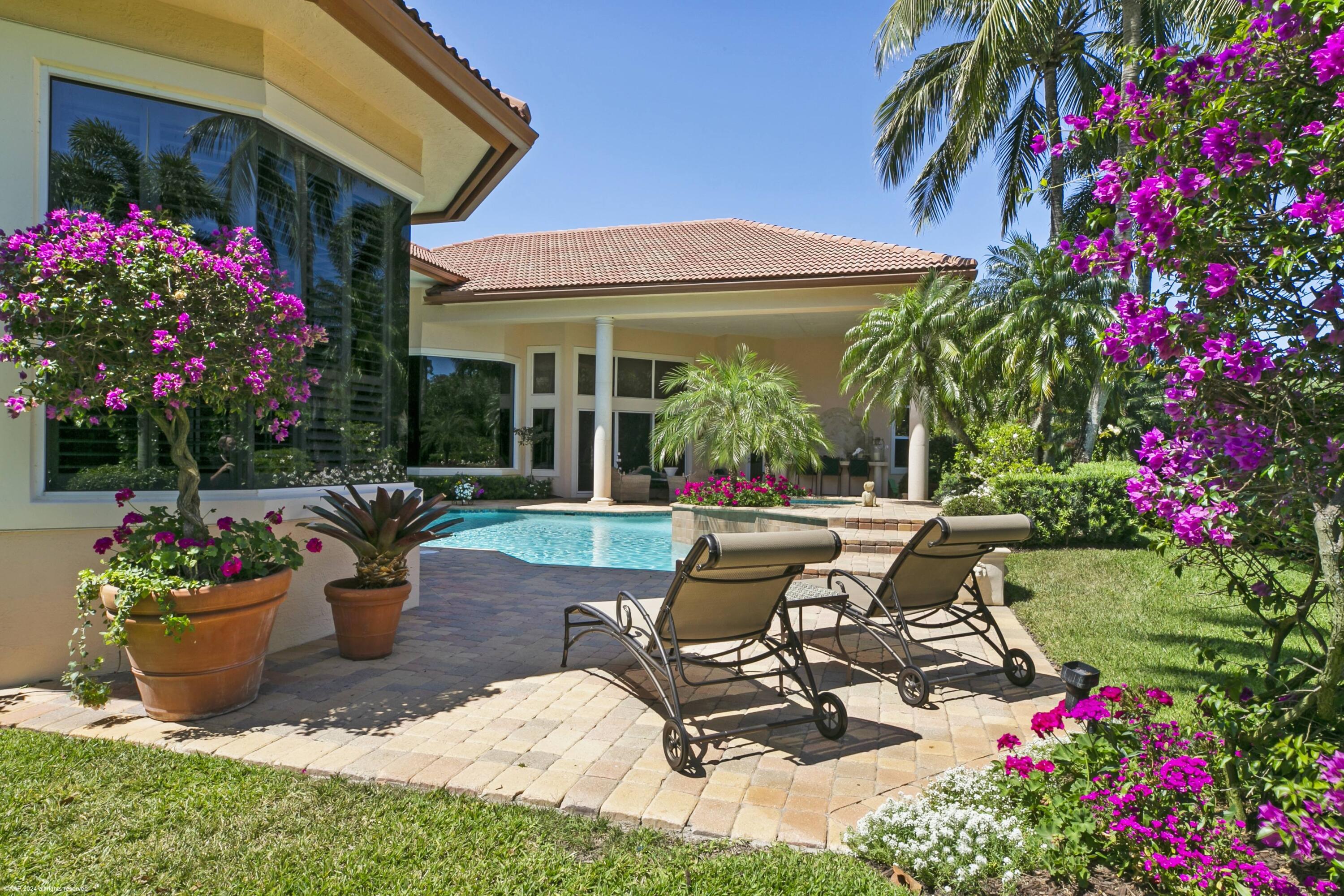 Don't miss this rare opportunity to live in one of Wellington's most sought-after locations! With significant improvements being completed at the horse show grounds, now is the perfect time to own in the prestigious Equestrian Club Estates, just steps from all the equestrian action.This magnificent estate home offers a spacious master wing with dual bathrooms for ultimate privacy and comfort. A cozy coffee bar adds warmth to your morning routine, while the recently resurfaced pool with a tranquil waterfall invites total relaxation.Set on an expansive estate-sized lot with meticulously landscaped grounds, this home offers both serenity and space with plenty of room to envision your dream guest house.Enjoy 4 bedrooms, 7 bathrooms, a dedicated office, and an air-conditioned three-car