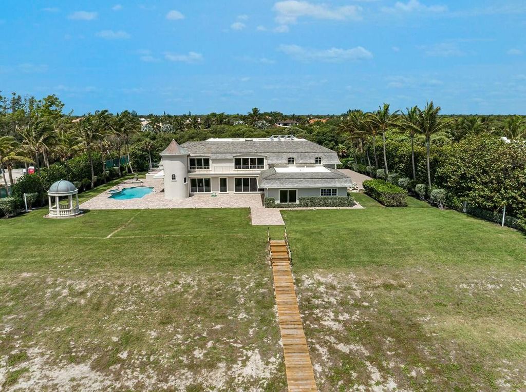 Photo of 477 S Beach Road, Jupiter Island, FL 33455 (MLS # R11038897)
