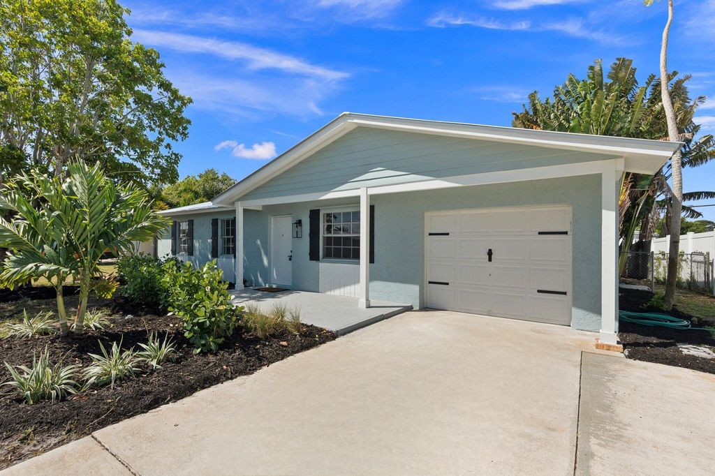 Photo of 2164 NE 15th Drive, Jensen Beach, FL 34957 (MLS # R10971977)