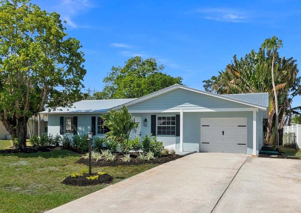 Photo of 2164 NE 15th Drive, Jensen Beach, FL 34957 (MLS # R10971977)