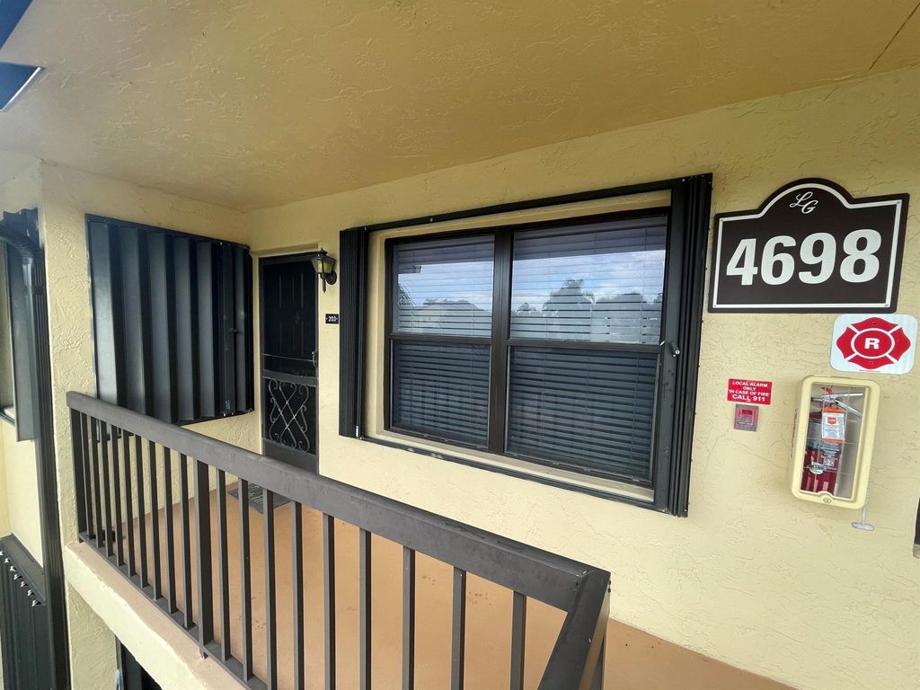 Photo of 4698 Lucerne Lakes Boulevard #203, Lake Worth, FL 33467 (MLS # R11013964)
